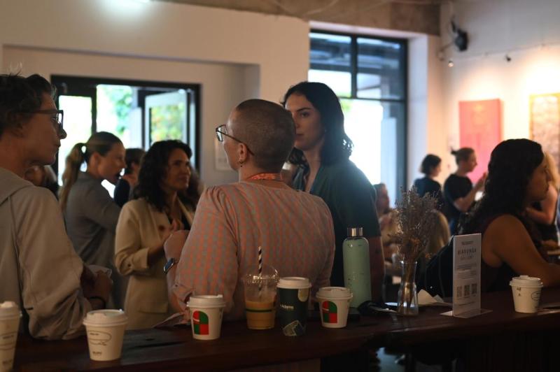 People mingling in a people filled room