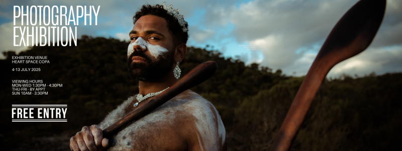 A man with a mountain in the background