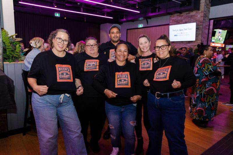 A trivia team all smiles