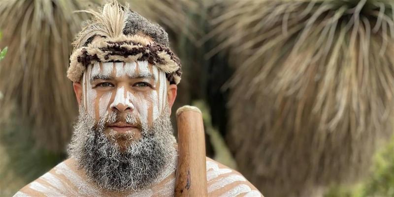A man with painted lines on his face